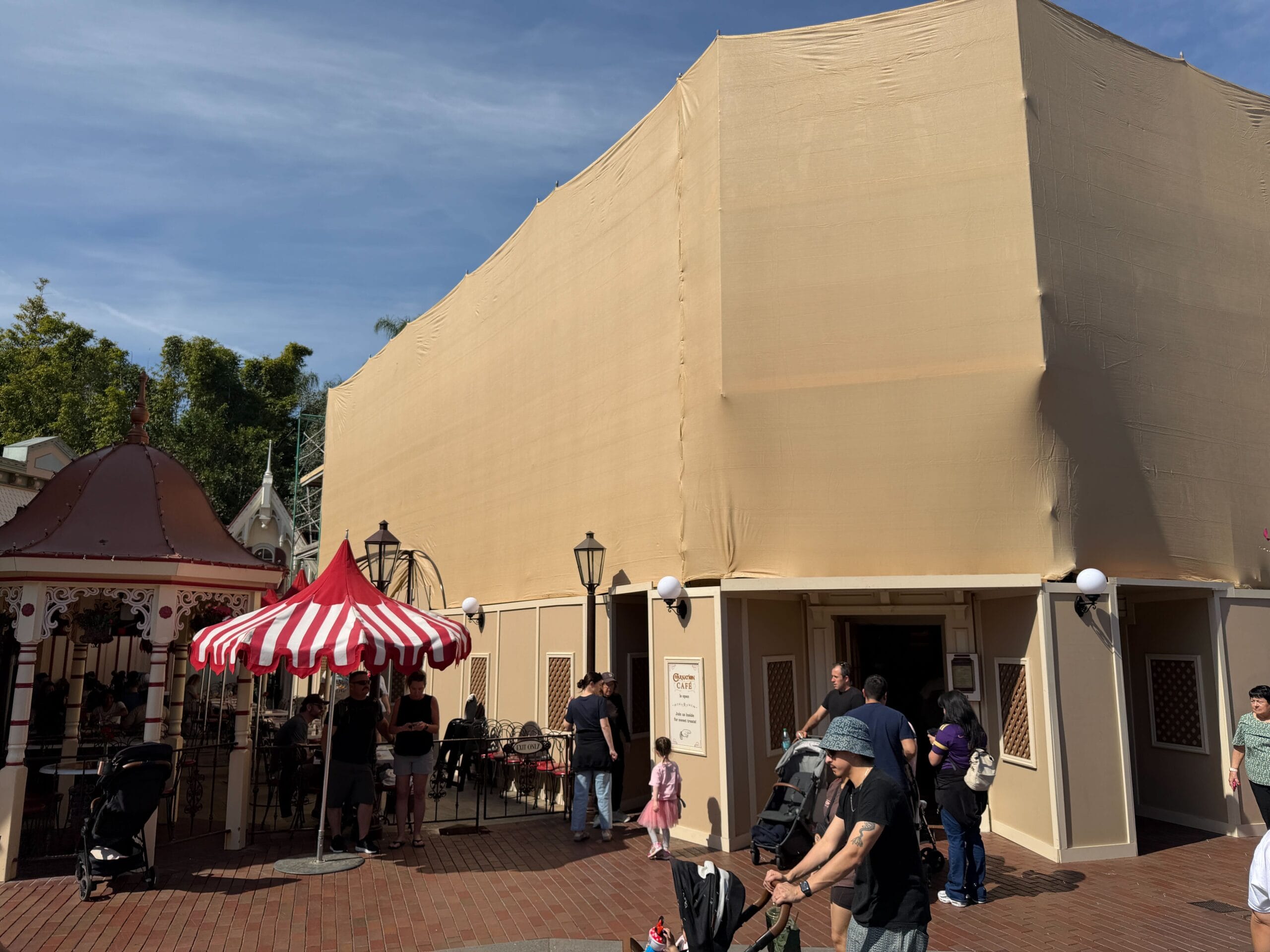 Beige scrim walls starting at Carnation Café on Main Street U.S.A. at Disneyland.
