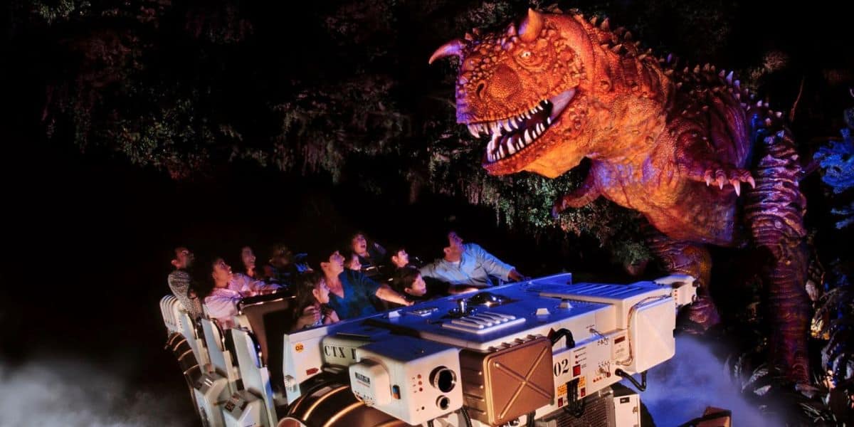 Guests riding the DINOSAUR attraction at Disney World